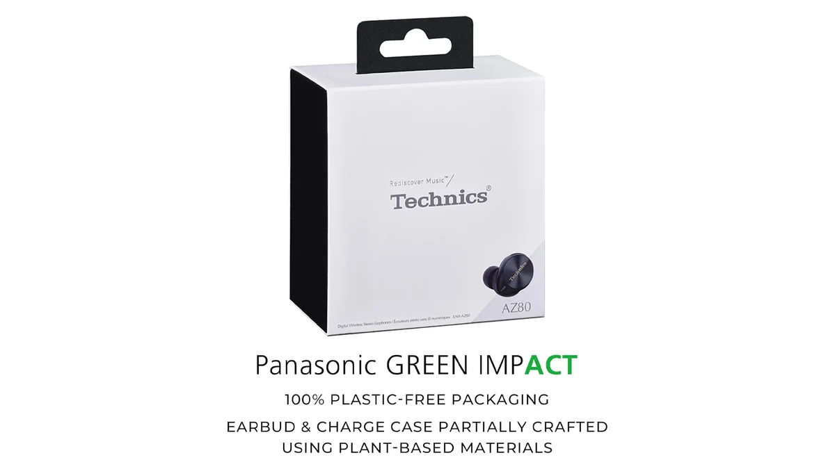 A person wearing the Technics EAH-AZ80 earbuds in a busy environment