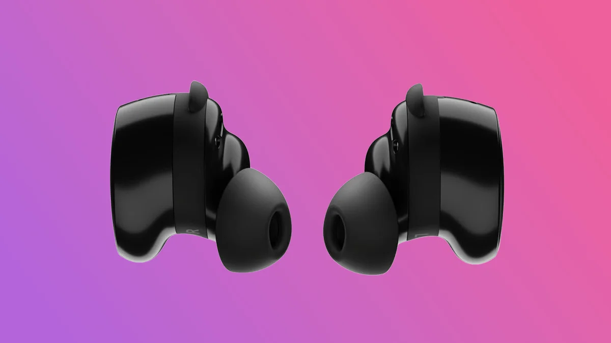 A person wearing the Bose QuietComfort Ultra Earbuds while commuting